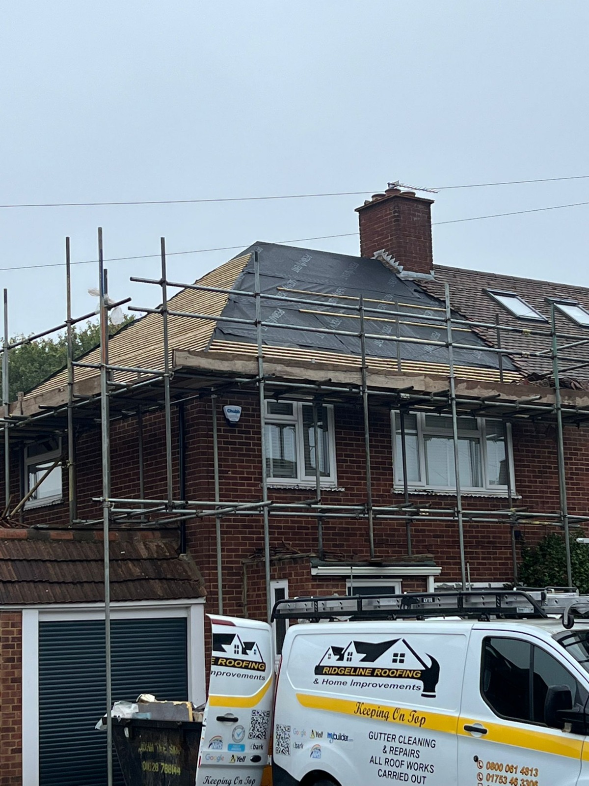 Roof replacement with scaffolding in progress