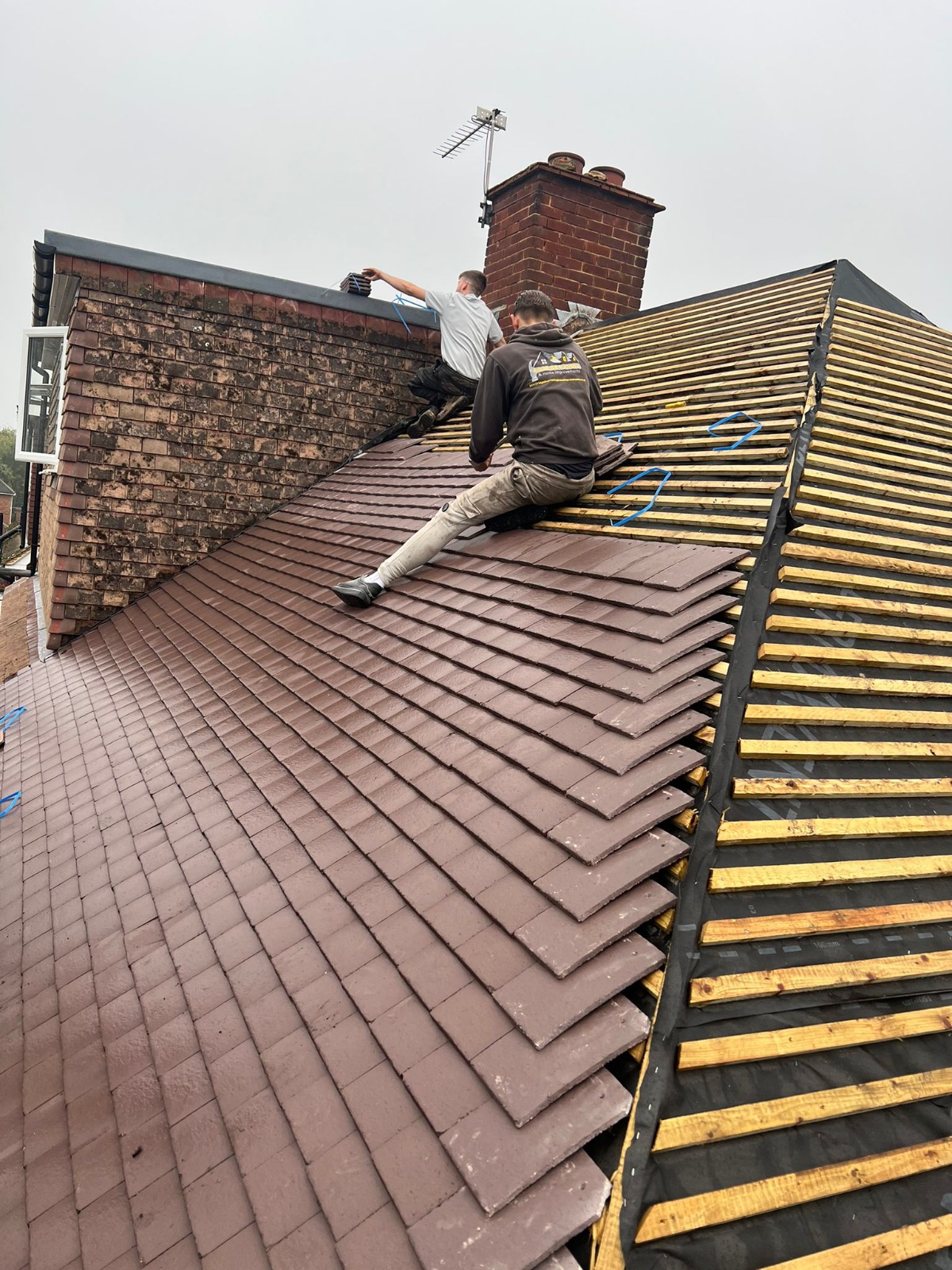 New roof tiles being installed
